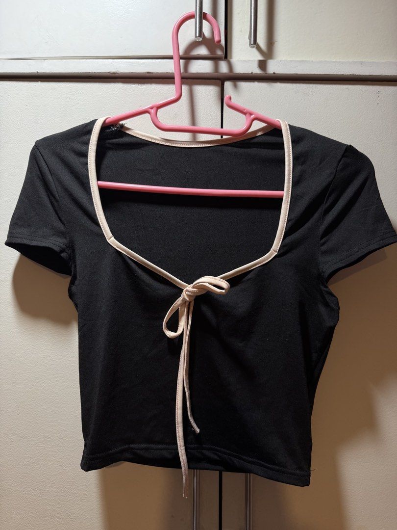 Black Cropped Top with Tie Detail (Category: Blouses) located in Manila. Submitted by baddxss (Listing ID 1461597432, Image 1). Description: - Black cropped top - Cute tie detail at the front - Contrasting trim on neckline and sleeves - Short sleeves - Stretchy material.