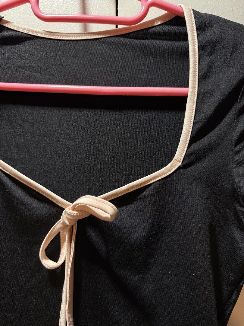 Black Cropped Top with Tie Detail (Category: Blouses) located in Manila. Submitted by baddxss (Listing ID 1461597432, Image 2). Description: - Black cropped top - Cute tie detail at the front - Contrasting trim on neckline and sleeves - Short sleeves - Stretchy material.