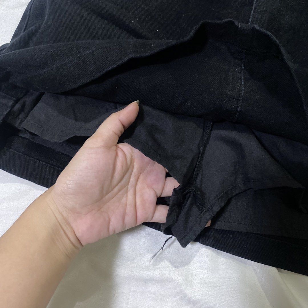 Black Denim A-Line Skirt with Double Button Closure (Category: Skirts) located in Rizal. Submitted by lili.s.choyce (Listing ID 1461727611, Image 3). Description: - Classic solid black denim skirt - Flattering A-line cut - Double button front closure - Functional pockets - Built-in shorts for added coverage - Size: 27-28 - Effortless to style with various tops and shoes.