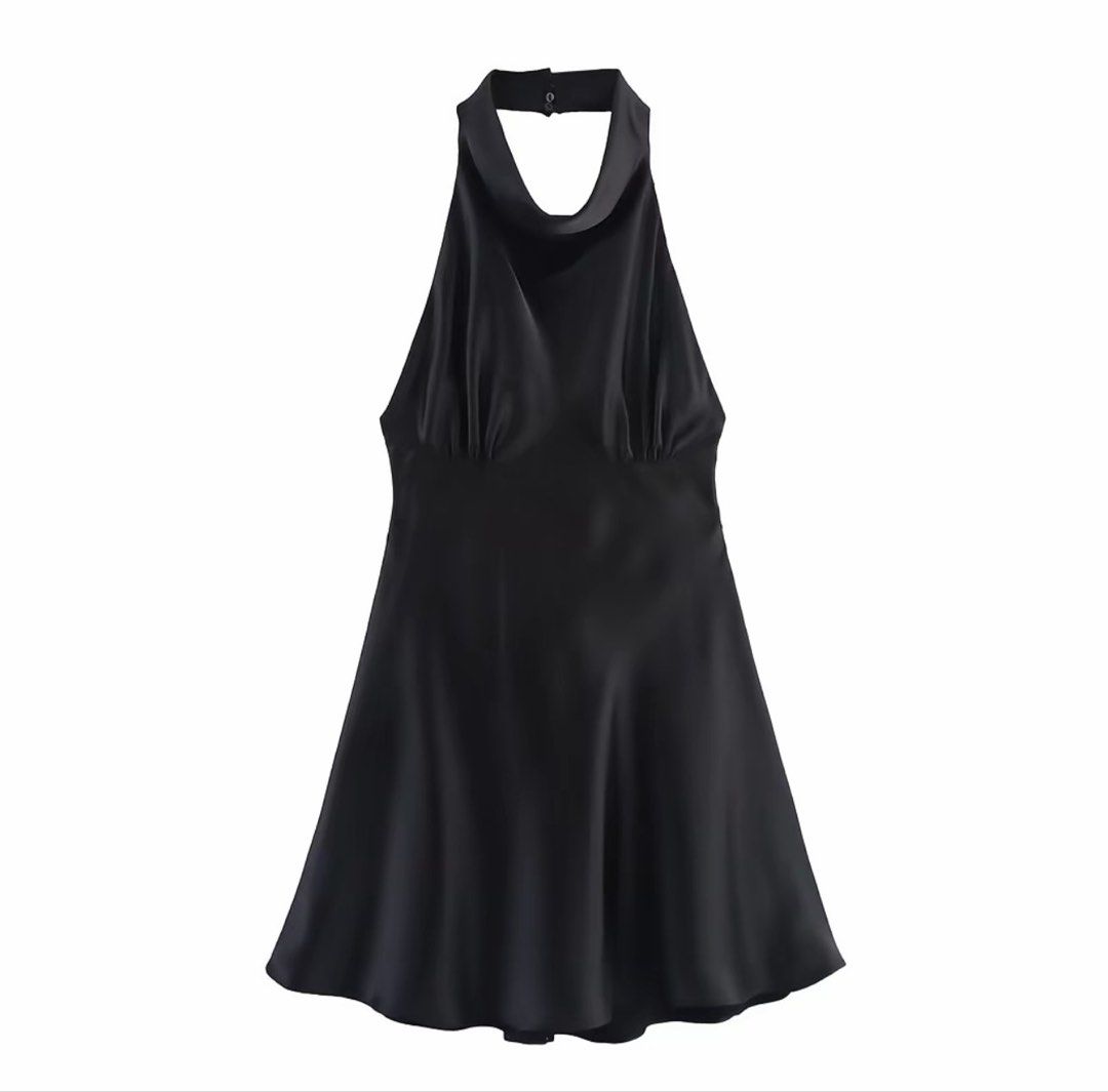 black halter neck backless dress (Category: Dresses) located in Quezon City. Submitted by leibear (Listing ID 1461568781, Image 3). Description: - satin - backless - has big straps na u tie at the back/side - size medium, true to size - i’m 5’2” & size 28 for reference - bought from tiktok shop for 648 - used once at a cocktail party.
