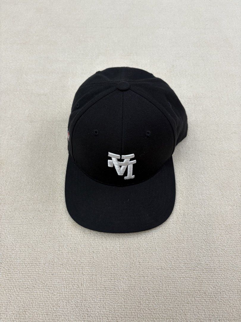 Black LA Dodgers New Era Fitted Cap (Category: Caps & Hats) located in Manila. Submitted by porma.market (Listing ID 1461577846, Image 2). Description: - Classic black cap with iconic white LA Dodgers embroidered logo. - New Era brand, fitted style. - Features the MLB logo on the side. - Ideal for baseball fans and streetwear enthusiasts. - A must-have accessory..