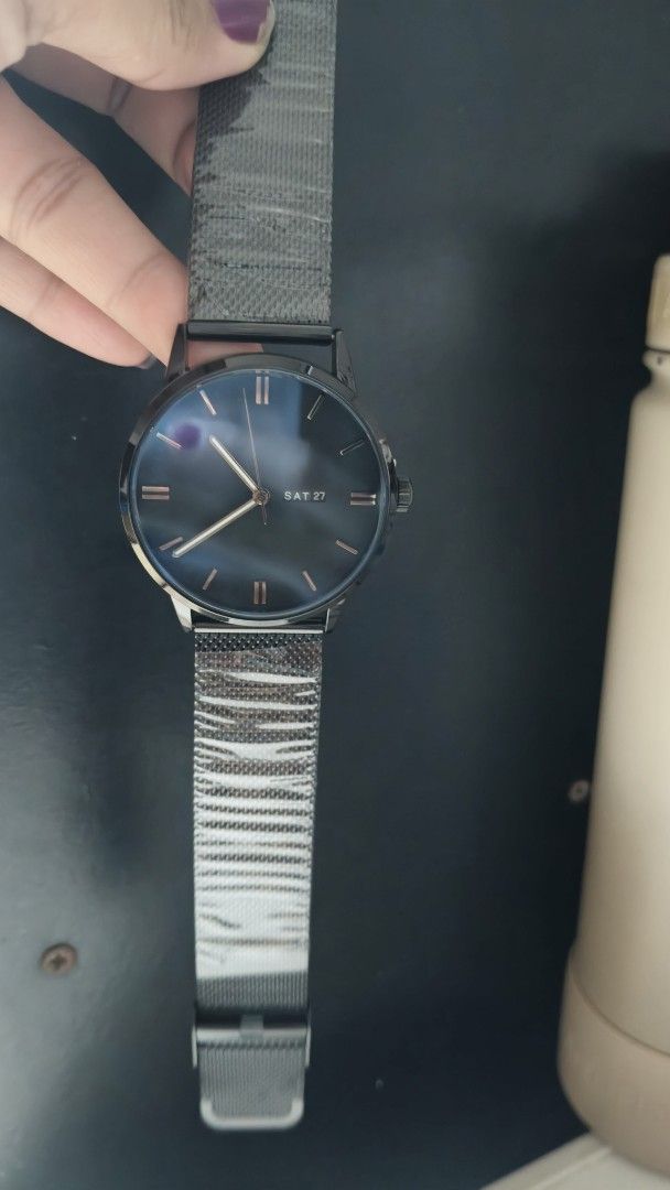 Black Mesh Strap Watch with Blue Dial (Category: Men's Watches) located in Taguig. Submitted by mercyeugen28914 (Listing ID 1461737883, Image 1). Description: - Minimalist black watch - Striking blue dial - Convenient day and date display - Adjustable black mesh metal strap with magnetic clasp - Modern and sleek design - Versatile for everyday or formal wear.