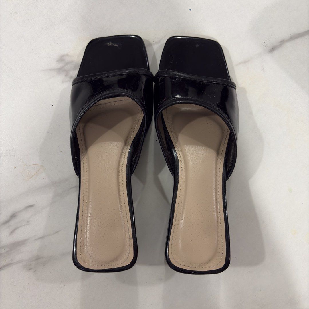 Black Patent Square Toe Block Heel Mules Sandals (Category: Heels) located in Manila. Submitted by wildstar-a982 (Listing ID 1461630084, Image 1). Description: Marikina Made Black Square Toe Heels Size 37 Location: Baliwag, Bulacan - can do meetup around baliwag Shipping: J&T, Lalamove, and SPX - shipping fee will be buyer’s expense .