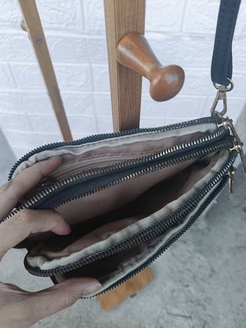 Black Quilted Crossbody Bag with Multiple Zippers (Category: Cross-body Bags) located in Cavite. Submitted by j_creations18 (Listing ID 1461580947, Image 2). Description: - Stylish black quilted crossbody bag - Multiple zippered compartments for organization - Adjustable strap for comfortable wear - Tarnished gold-tone hardware details - Ideal for everyday use or travel - Fits your phone, wallet, and keys .