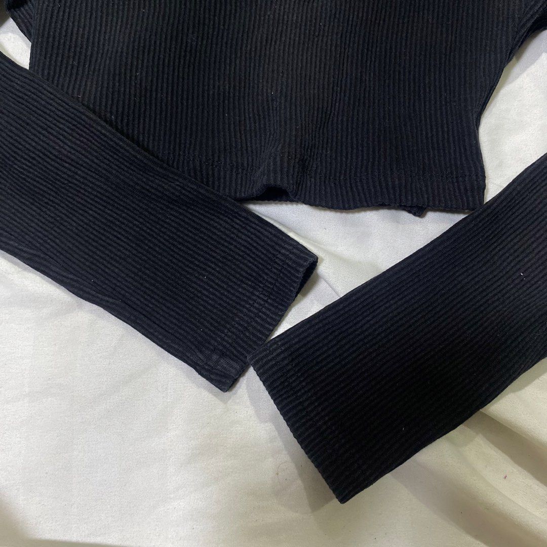 Black Ribbed Collared Long Sleeve Crop Top (Category: Longsleeves) located in Rizal. Submitted by lili.s.choyce (Listing ID 1461727290, Image 3). Description: - Black ribbed long sleeve crop top - Features a collared neckline and V-neck opening - Super comfy and stylish design - Ideal for layering or wearing on its own - Easily pairs with jeans or skirts - Solid black in actual - Best fit: S-M.