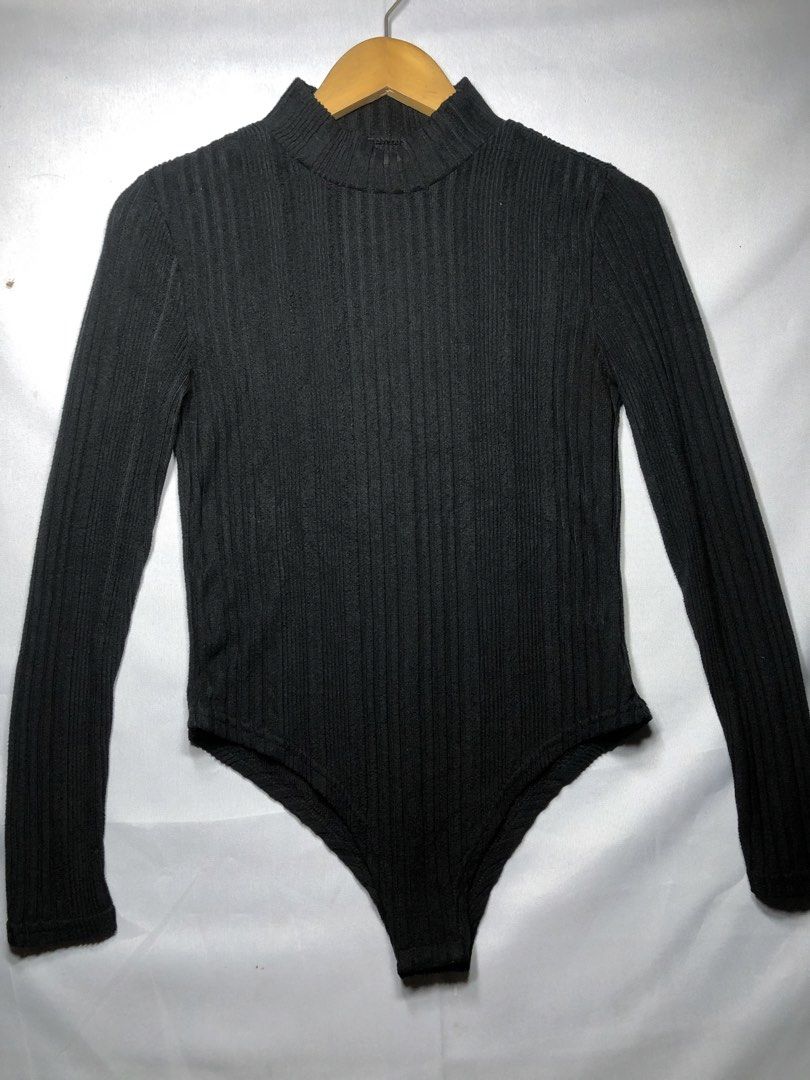 black ribbed mock-neck long-sleeve bodysuit (Category: Longsleeves) located in Cagayan de Oro. Submitted by itzme_cing (Listing ID 1461714983, Image 1). Description: .