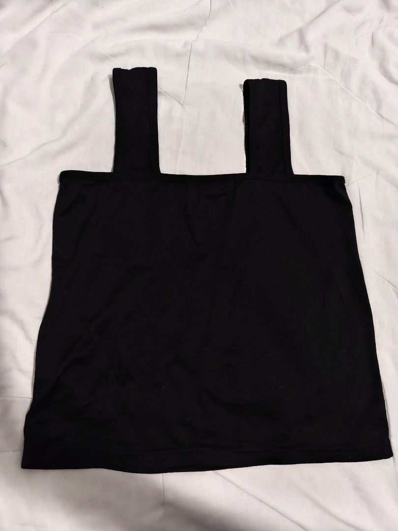 Black Square Neck Tank Top (Category: Sleeveless) located in Antipolo. Submitted by _suspiria (Listing ID 1461670918, Image 1). Description: - Small to Medium - Basic black tank top - Square neckline - Two thick straps - Simple and versatile design - Stretchy material for comfort - Perfect for layering or wearing solo - Easy to match with any outfit.