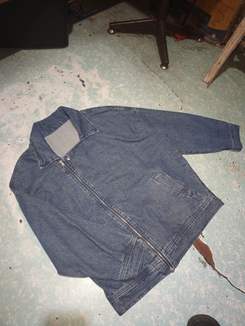 Blue Denim Harington Zip-Up Jacket (Category: Coats, Jackets and Outerwear) located in Calauag. Submitted by erv_1n (Listing ID 1461639002, Image 2). Description: - Classic blue denim jacket - Full zip-up front - Two chest pockets with button closures - Side pockets - Long sleeves with button cuffs - Collar neckline - Relaxed fit - Ideal for layering.