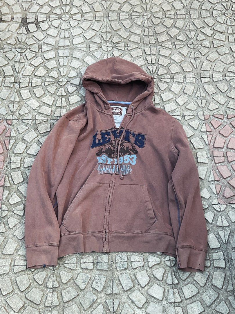Blue GAP Zip-Up Hoodie (Category: Coats, Jackets and Outerwear) located in Mabalacat. Submitted by epicforest_78284 (Listing ID 1461685138, Image 2). Description: Classic blue GAP zip-up hoodie. Features the iconic GAP logo in orange and yellow on the chest. Two front pockets. Drawstring hood. Great for casual wear..