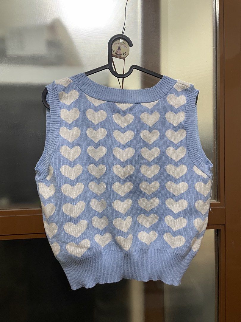 Blue Heart Pattern Knit Vest Freesize (M-Semi XL) (Category: Sleeveless) located in Manila. Submitted by erin.iah (Listing ID 1461651185, Image 2). Description: Heart Pattern Blue Knitted Vest Freesize, fits M-Semi XL Bought back a few years ago. No stains. Pm if interested!.