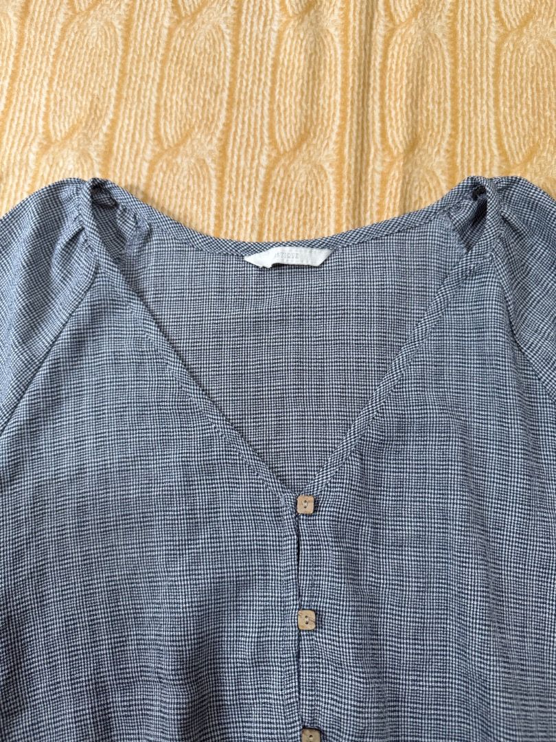 Blue Striped V-Neck Button-Up Cropped Blouse (Category: Blouses) located in Calasiao. Submitted by clothesbykim (Listing ID 1461701892, Image 2). Description: - Light blue and white striped blouse - V-neck with button-up front - Long sleeves with elastic cuffs - Cropped length with elastic hem - Textured fabric for a comfy and stylish look.