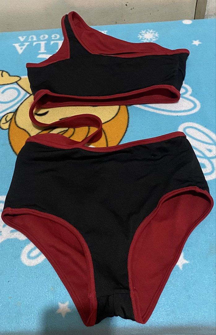 Bobbyfit Red One-Shoulder Bikini Set Size S (Category: Bikinis & Swimsuits) located in Manila. Submitted by resi.diaz (Listing ID 1461623956, Image 3). Description: - Cute Bobbyfit bikini set - Size: S - Color: Red with black lining - Style: One-shoulder top, high-waisted bottoms - Perfect for swimming or poolside lounging - Comfortable and stylish.