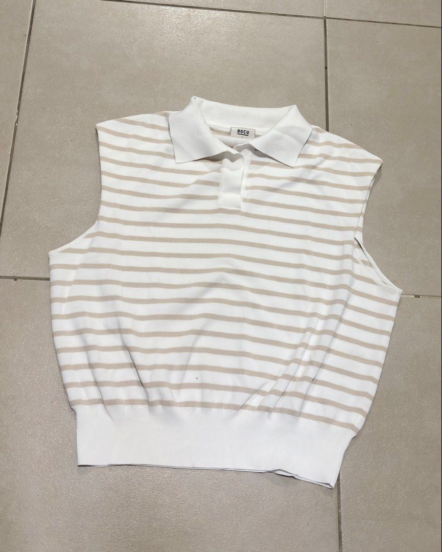 Bocu Stripe Tucked Sleeve Polo (Category: Others Tops) located in Manila. Submitted by _maisonseconde (Listing ID 1461696190, Image 1). Description: Bocu Stripe Tucked Sleeve Polo - Knitted Polo in Sand and White Stripes - worn only two times Size : Large MOP - BP1/Shope3Pay MOD - same day delivery (based fr Pasay) Message for Inquiries :) .