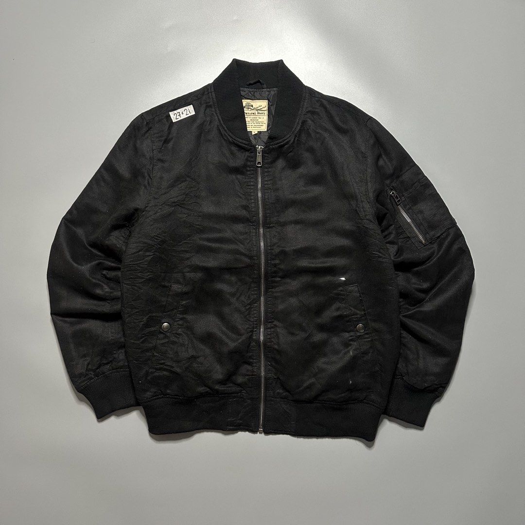 Bomber Jacket (Category: Coats, Jackets and Outerwear) located in Baguio. Submitted by subaitems (Listing ID 1461642982, Image 1). Description: - Black bomber jacket by Natural Story - Quilted lining for extra warmth - Zip-up front closure - Two side pockets - Zippered pocket on the sleeve - Ribbed collar, cuffs, and hem - Ideal for everyday casual wear.