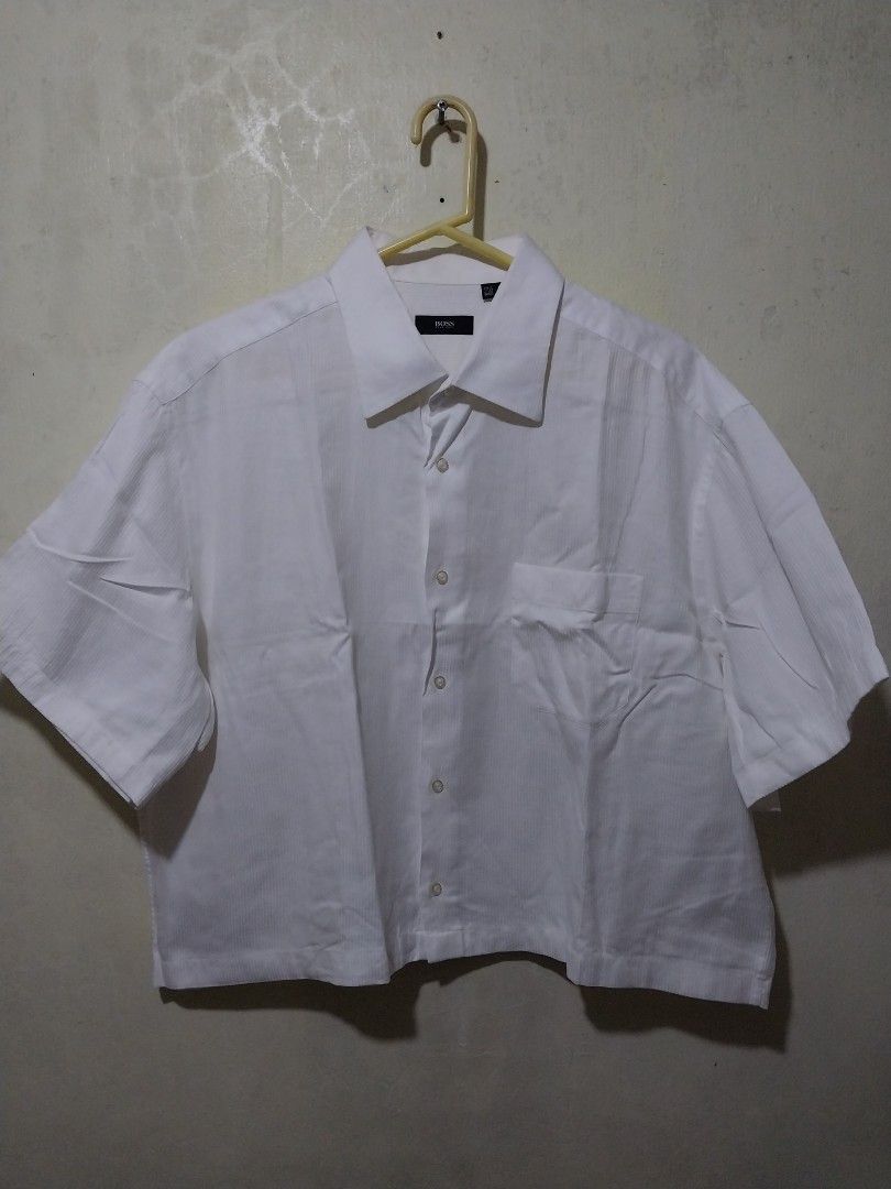 BOSS White cropped polo (Category: Tshirts & Polo Shirts ) located in Manila. Submitted by PrinceDani.Clothing (Listing ID 1461687090, Image 1). Description: Hugo boss white cropped polo large fit 27in width 22in length excellent condition .