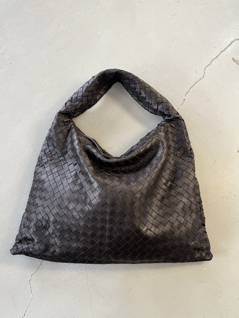 Bottega Veneta Hop Bag (Category: Shoulder Bags) located in San Fernando. Submitted by archivalhighlights (Listing ID 1461673623, Image 2). Description: The selected region shows a dark brown leather woven hobo bag with a slouchy trapezoid shape and a folded top handle, resembling the Bottega Veneta Hop Bag.