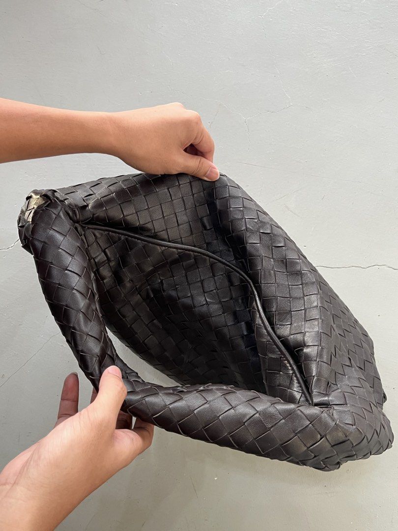 Bottega Veneta Hop Bag (Category: Shoulder Bags) located in San Fernando. Submitted by archivalhighlights (Listing ID 1461673623, Image 3). Description: The selected region shows a dark brown leather woven hobo bag with a slouchy trapezoid shape and a folded top handle, resembling the Bottega Veneta Hop Bag.
