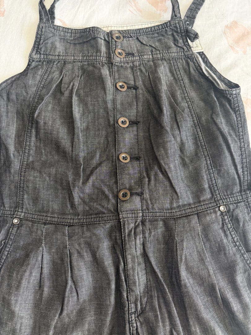 Boyfriend Jeans Grey Denim Jumpsuit (Category: Jumpsuits) located in Manila. Submitted by fitandshop (Listing ID 1461574713, Image 1). Description: - Grey denim jumpsuit from Boyfriend Jeans - Button front closure - Adjustable straps - Two side pockets - Pleated detail at the waist - Full length pants - Ideal for casual wear.