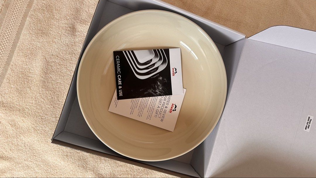 Brand New Staub Ceramic Bowl / Serving Dish (Authentic) (Category: Other Kitchenware & Tableware) located in Balete No 2. Submitted by rynsells_ (Listing ID 1461597148, Image 1). Description: Selling an authentic, brand-new Staub Ceramic (Céramique) serving bowl in an elegant off-white/cream finish. Staub is a iconic French cookware brand known for its exceptional durability, heat retention, and scratch-resistant enamel. Perfect for pasta, salads