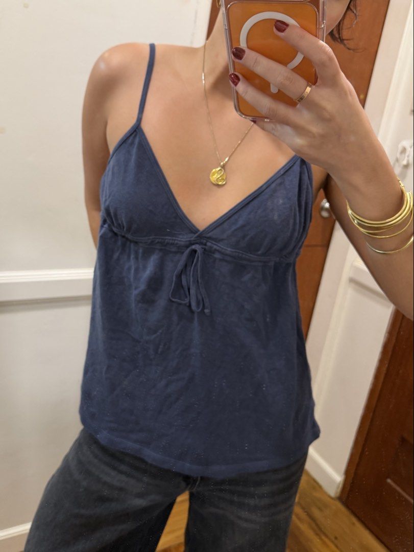 Brandy Melville Babydoll Top (Category: Others Tops) located in Manila. Submitted by beysclosett (Listing ID 1461768845, Image 2). Description: - never used - brand new / recently bought + with tags - fabric is soft and comfy! - front ribbon is adjustable - fits XS-M!.