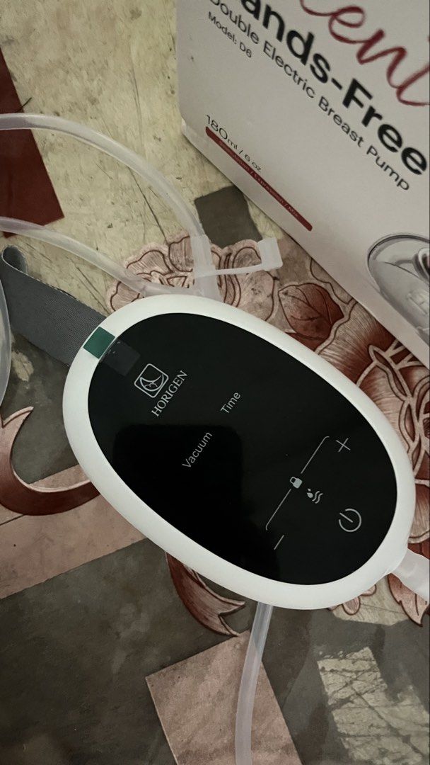 Breast Pump Horigen Decent Go 6 (Category: Breastfeeding & Bottle Feeding) located in Muntinlupa City. Submitted by clought (Listing ID 1461657141, Image 2). Description: - Brand: Horigen - Model: Decent Go D6 - Type: Hands-Free Double Electric Breast Pump - Capacity: 180ml / 6 oz per cup - Design: Ergonomic and comfortable - Operation: Electric, double pumping - Condition: Gently used, excellent working order - Features: USB rechargeable, quiet 