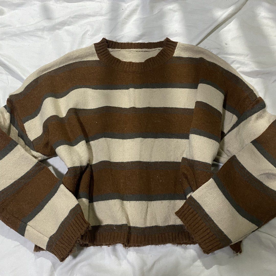 Brown Cream Striped Knit Sweater (Category: Coats, Jackets and Outerwear) located in Rizal. Submitted by lili.s.choyce (Listing ID 1461724857, Image 1). Description: - Cozy knit sweater - Best fit: S-Semi L - Classic horizontal stripes in brown, cream - Long sleeves with ribbed cuffs - Comfortable crew neckline - Ideal for layering or standalone wear - Soft and comfortable material.