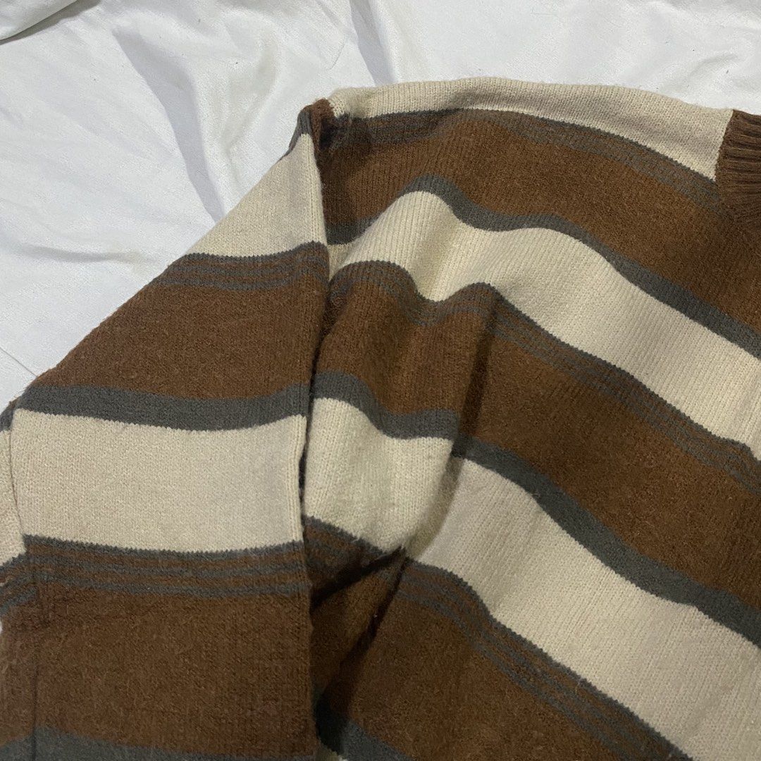 Brown Cream Striped Knit Sweater (Category: Coats, Jackets and Outerwear) located in Rizal. Submitted by lili.s.choyce (Listing ID 1461724857, Image 2). Description: - Cozy knit sweater - Best fit: S-Semi L - Classic horizontal stripes in brown, cream - Long sleeves with ribbed cuffs - Comfortable crew neckline - Ideal for layering or standalone wear - Soft and comfortable material.