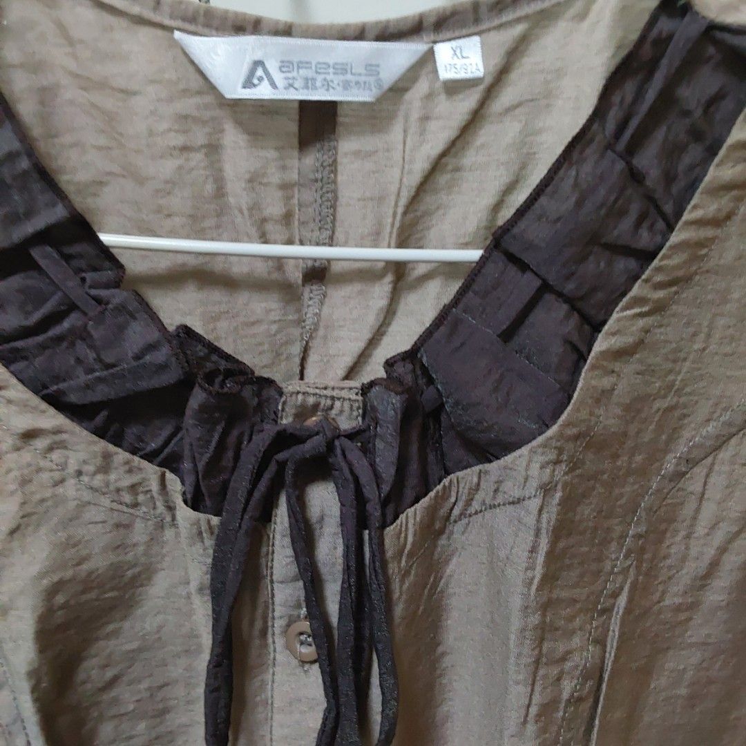 Brown whimsy top with self tie (Category: Blouses) located in Magarao. Submitted by cinabonthrifts (Listing ID 1461729816, Image 2). Description: Size: s-m MOP: Gcash MOD: Jnt.