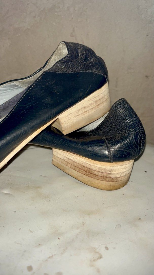 Buffalo Leather Loafers with Studs (Category: Loafers) located in Rizal. Submitted by va_nes_sa_ (Listing ID 1461664514, Image 2). Description: - Brand: Buffalo - Type: Leather Loafers - Color: Black - Size: 37 - Origin: Made in Italy - Unique Design: Blue and black studs on the front - Heel: Wooden heel - Condition: Signs of wear on soles and leather, but plenty of life left..