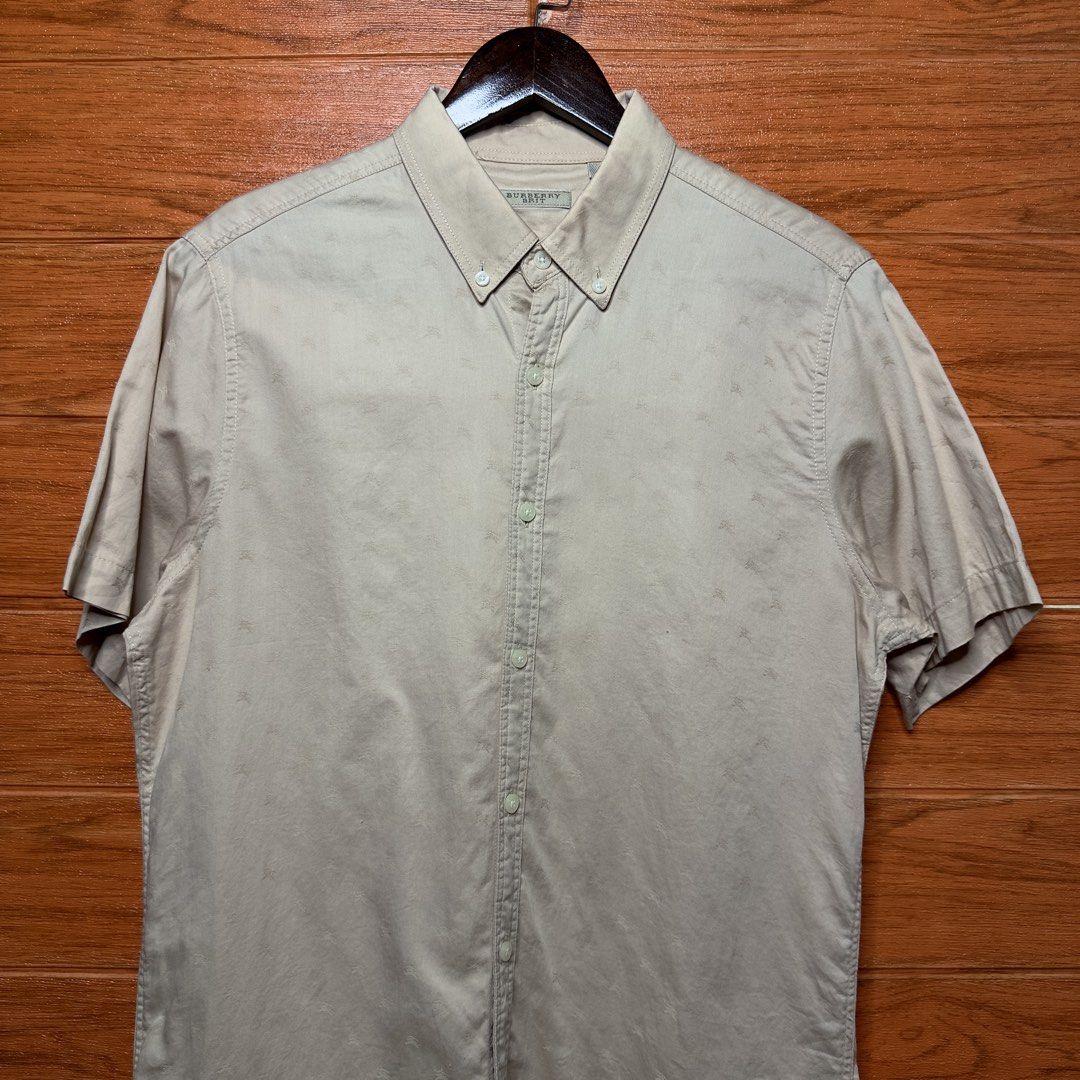 Burberry Brit All over Logo Beige Button down (Category: Formal Shirts) located in Quezon City. Submitted by donklasiko (Listing ID 1461788279, Image 3). Description: Condition: 9.5+/10 Pristine condition Issue: non Refer to the dimension 🤗 PM FOR MORE DETAILS NO RETURN, NO EXCHANGE & NO REFUND! ✅I ALSO ACCEPT TRADE/SWAP TO ANYTHING JUST DROP YOUR OFFER Please manage your expectations, this is a secondhand item. What you see is what you get 😊 �