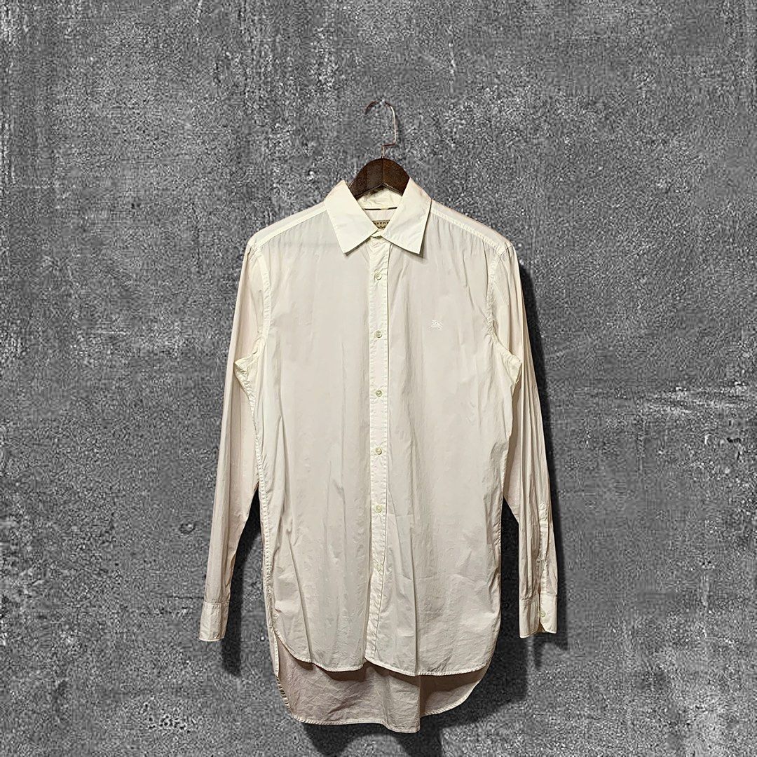Burberry Button down (Category: Formal Shirts) located in Quezon City. Submitted by donklasiko (Listing ID 1461573336, Image 1). Description: Condition: 9.5+/10 Pristine condition Issue: non Refer to the dimension 🤗 PM FOR MORE DETAILS NO RETURN, NO EXCHANGE & NO REFUND! ✅I ALSO ACCEPT TRADE/SWAP TO ANYTHING JUST DROP YOUR OFFER Please manage your expectations, this is a secondhand item. What you see is what you get 😊 💵MOP: GCASH, BDO or Cash 