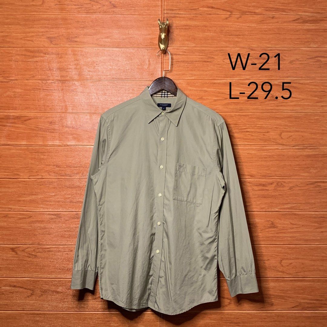 Burberry London Beige Button down (Category: Formal Shirts) located in Quezon City. Submitted by donklasiko (Listing ID 1461573513, Image 2). Description: Condition: 9.5+/10 Pristine condition Issue: non Refer to the dimension 🤗 PM FOR MORE DETAILS NO RETURN, NO EXCHANGE & NO REFUND! ✅I ALSO ACCEPT TRADE/SWAP TO ANYTHING JUST DROP YOUR OFFER Please manage your expectations, this is a secondhand item. What you see is what you get 😊 💵MOP: GCASH,