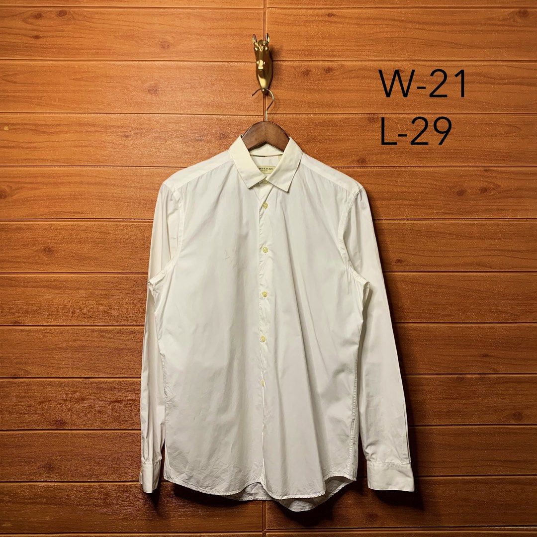 Burberry London Button down (Category: Formal Shirts) located in Quezon City. Submitted by donklasiko (Listing ID 1461567459, Image 2). Description: Condition: 9.5+/10 Pristine condition Issue: non Refer to the dimension 🤗 PM FOR MORE DETAILS NO RETURN, NO EXCHANGE & NO REFUND! ✅I ALSO ACCEPT TRADE/SWAP TO ANYTHING JUST DROP YOUR OFFER Please manage your expectations, this is a secondhand item. What you see is what you get 😊 💵MOP: GCASH, BDO o
