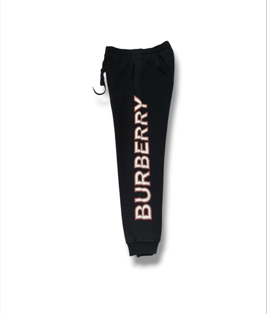 Burberry Script Logo Jogger Pants (Category: Luxury Apparel) located in Bulacan. Submitted by sanjisthrift (Listing ID 1461626962, Image 2). Description: Width 26-30 Length 38 Good Condition 9/10 Good fade.