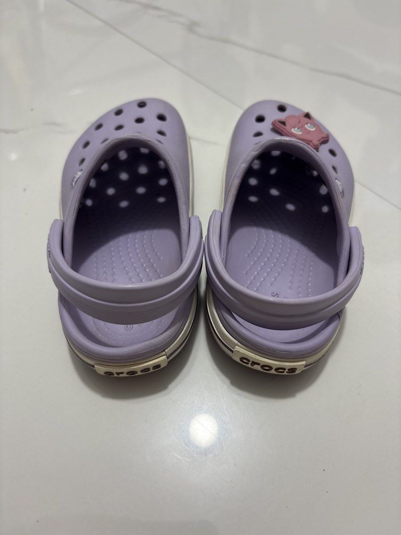 C7 (14cm) - Preloved Crocs (Category: Babies & Kids Fashion) located in Cavite. Submitted by crisalyn___ (Listing ID 1461715940, Image 3). Description: - Cute purple Crocs for kids - Features a Jigglypuff charm - Easy slip-on and off design - Perfect for playtime and casual wear.