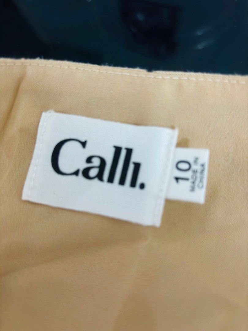 Calli wrap mini dress (Category: Dresses) located in Subic. Submitted by Rodsbestbuys (Listing ID 1461613361, Image 3). Description: Wrap pretty dress Size 10 .