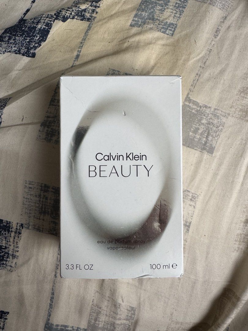 Calvin Klein Beauty Eau de Parfum (100ml) (Category: Fragrance & Deodorants) located in Bacoor. Submitted by iscbelles (Listing ID 1461618333, Image 1). Description: 🔖 calvin klein beauty eau de parfum spray (100ml) by calvin klein — padala from dubai this january — unsealed but with box — floral-woody, top note: ambrette; heart/middle note: jasmine; base note: cedarwood — sprayed a few times to test, but other than that remains unused 📍 loc: b