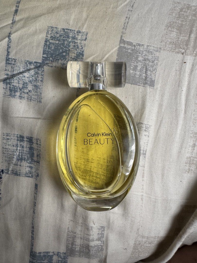 Calvin Klein Beauty Eau de Parfum (100ml) (Category: Fragrance & Deodorants) located in Bacoor. Submitted by iscbelles (Listing ID 1461618333, Image 2). Description: 🔖 calvin klein beauty eau de parfum spray (100ml) by calvin klein — padala from dubai this january — unsealed but with box — floral-woody, top note: ambrette; heart/middle note: jasmine; base note: cedarwood — sprayed a few times to test, but other than that remains unused 📍 loc: b