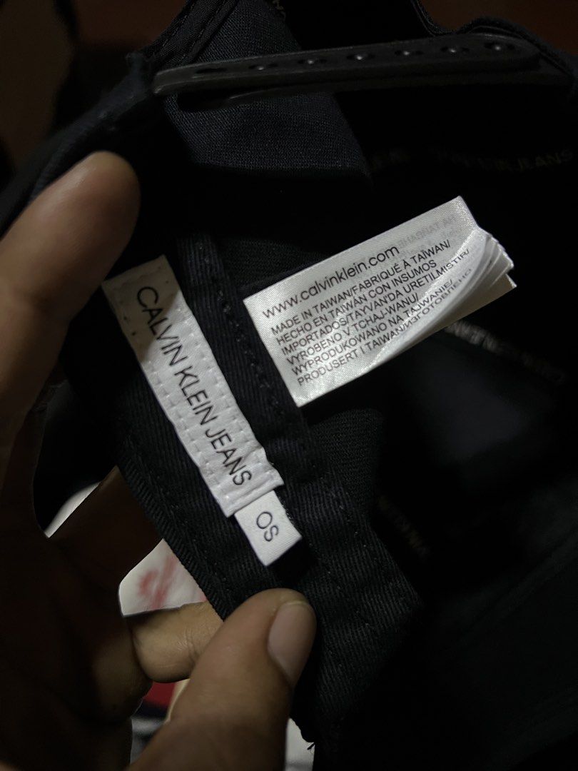 Calvin Klein Jeans Black Cap OS (Category: Caps & Hats) located in Davao. Submitted by dubdabi.co (Listing ID 1461780478, Image 3). Description: - Classic black Calvin Klein Jeans cap - Features iconic CK Jeans logo embroidery on the front - Adjustable snapback closure for a personalized fit - One size fits most - Made in Taiwan.
