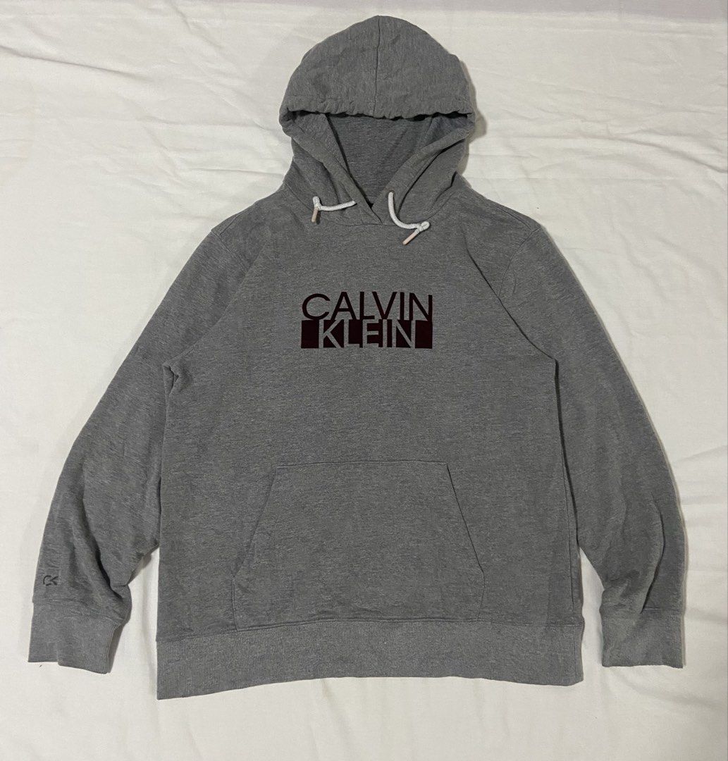 Calvin Klein Performance Grey Hoodie (Category: Hoodies) located in Baybay. Submitted by comicowl (Listing ID 1461720736, Image 1). Description: - Grey Calvin Klein Performance hoodie - Features iconic Calvin Klein logo on the front - Size XL/TG - Made in Indonesia - Comfortable and casual design - Perfect for everyday wear.