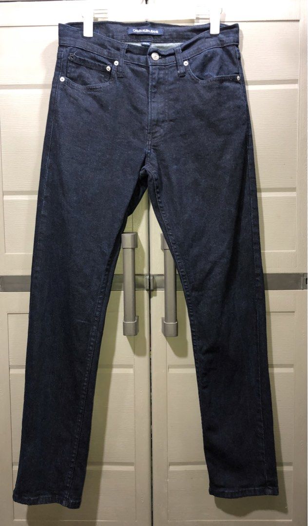 Calvin Klein Slim fit Jeans (Category: Jeans) located in Cebu City. Submitted by jiselle_fecollection (Listing ID 1461577079, Image 2). Description: -can fit 30-32 waistline -zipper and button closure -slim straight -blue jeans -L-39.5 -98% Cotton 2 % elastane.