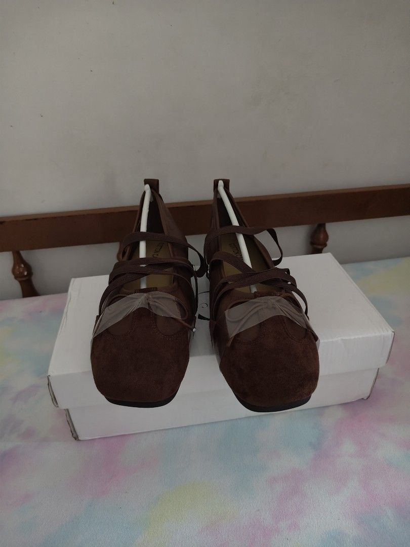 Candy Step Brown Ballet Flats with Straps (Category: Flats & Sandals) located in Manila. Submitted by ma.titania (Listing ID 1461607372, Image 1). Description: - Brand: Cotton Candy - Style: Ballet Flats - Color: Brown - Features: Criss-cross straps, suede toe cap detail - Condition: Brand new, never worn - Includes: Original box.