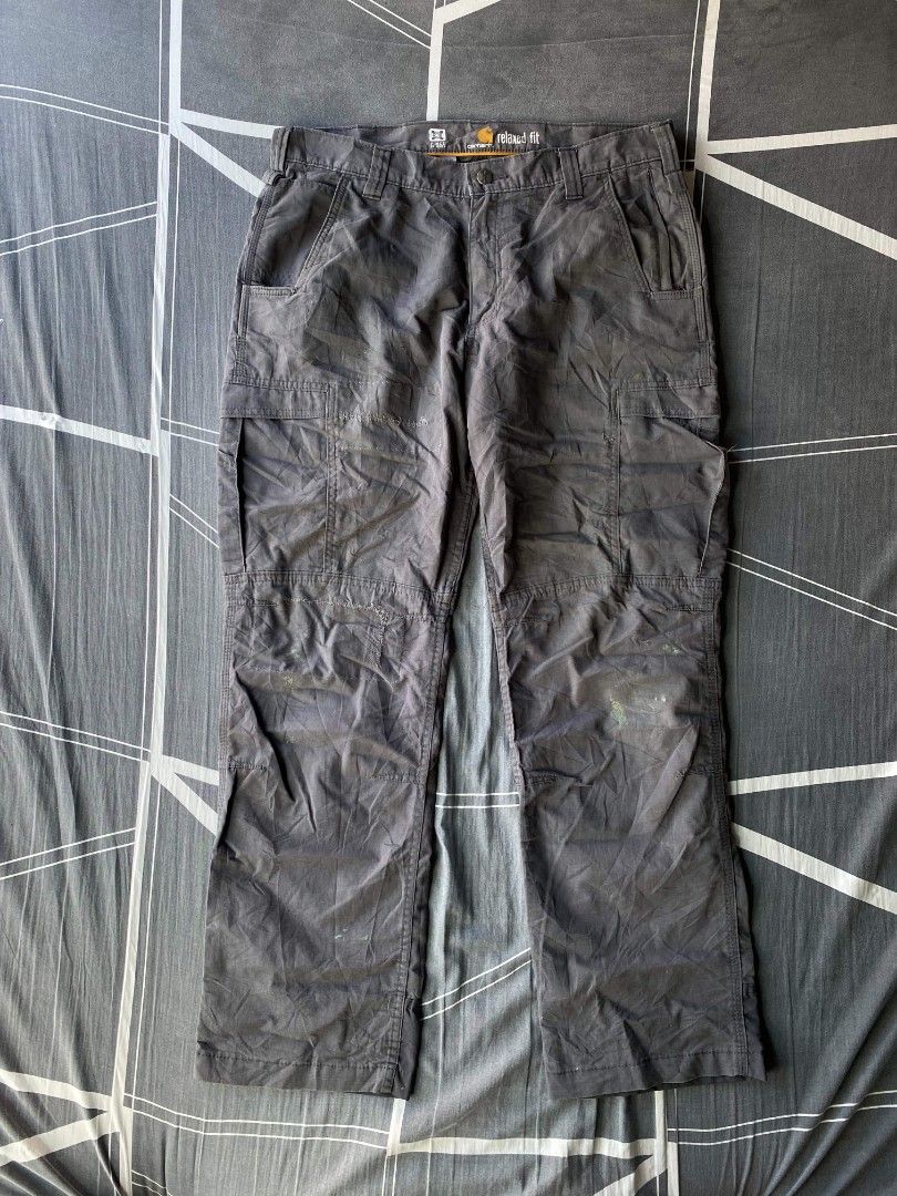 Carhartt Relaxed Fit Cargo Pants (Category: Jeans) located in Manila. Submitted by raymondrob54698 (Listing ID 1461598327, Image 3). Description: - Carhartt Cargo Pants - Relaxed Fit - Dark Grey Color - Durable Workwear Style - Multiple Pockets for Storage - Ideal for everyday wear or work size 36.