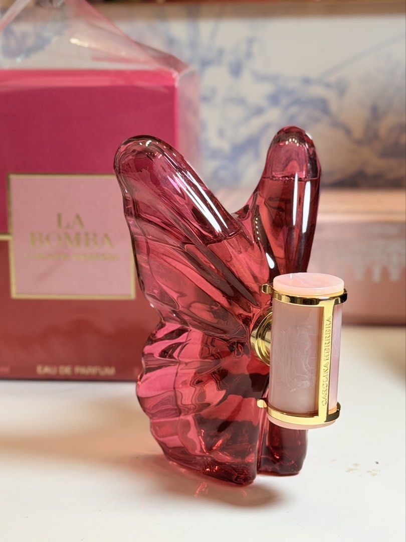 Carolina Herrera La Bomba EDP (Category: Fragrance & Deodorants) located in Manila. Submitted by fundmynxtshopping (Listing ID 1461772356, Image 1). Description: -full sized ✨ 80ml/ used 2x - Released just last year, bought early this year at Zayed International Airport Duty Free. - Still nego, just mssg if more proof of authenticity is needed. 🫶🏻 Lalamove ready 💨 .
