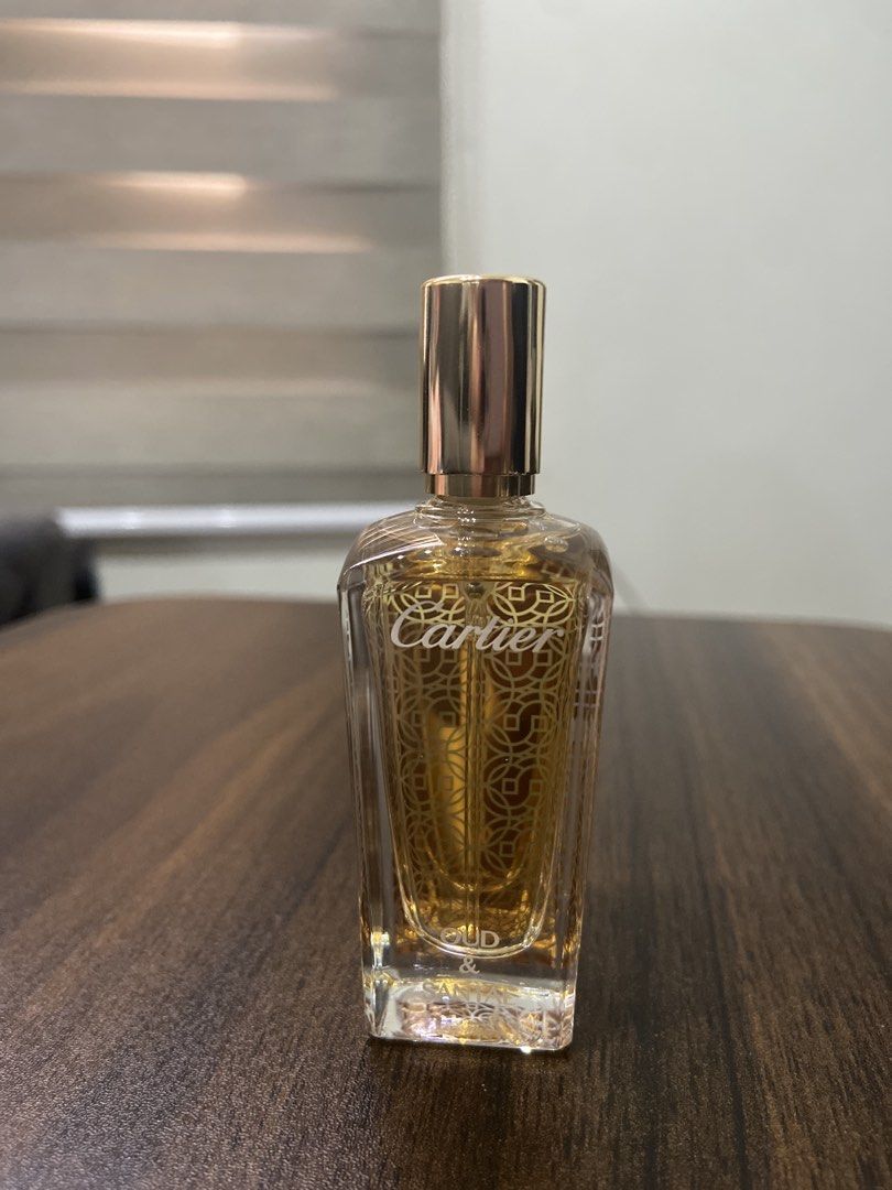 Cartier Oud & Santal Eau de Parfum (Category: Fragrance & Deodorants) located in Makati City. Submitted by pink.velvet (Listing ID 1461578588, Image 1). Description: - Authentic Cartier perfume bottle - Scent: Oud & Santal - Features a luxurious gold cap - Intricate gold detailing on the glass - Beautiful, collectible bottle design - Ideal as a gift - 15ml.
