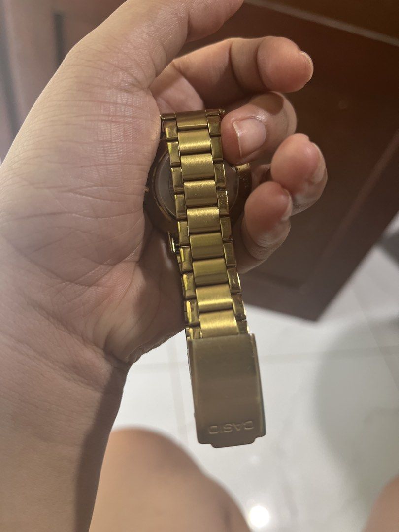 Casio Gold Tone Water Resist Watch (Category: Women's Watches) located in Manila. Submitted by camron08 (Listing ID 1461594195, Image 2). Description: - Gold-tone Casio watch - Classic black dial with gold hands and markers - Water resistant - Simple and elegant design, ideal for everyday use - Secure clasp closure.