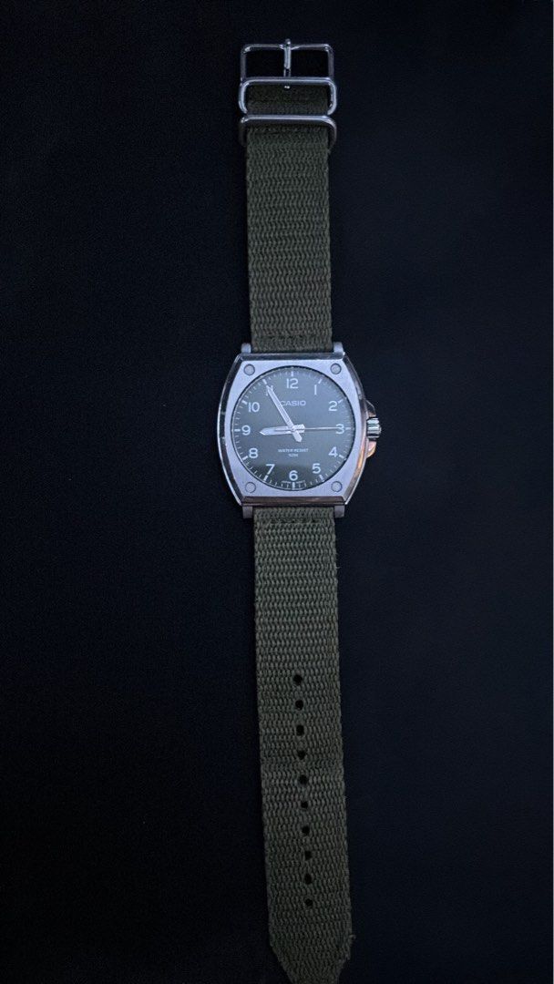 CASIO MTP-E730C-3AV WATCH (Category: Men's Watches) located in Cebu City. Submitted by kingkongma09919 (Listing ID 1461714915, Image 1). Description: - Classic Casio watch - Dark face with easy-to-read Arabic numerals - Durable green nylon strap - Water resistant up to 50 meters - Ideal for everyday casual wear and outdoor activities - Simple and reliable timepiece.