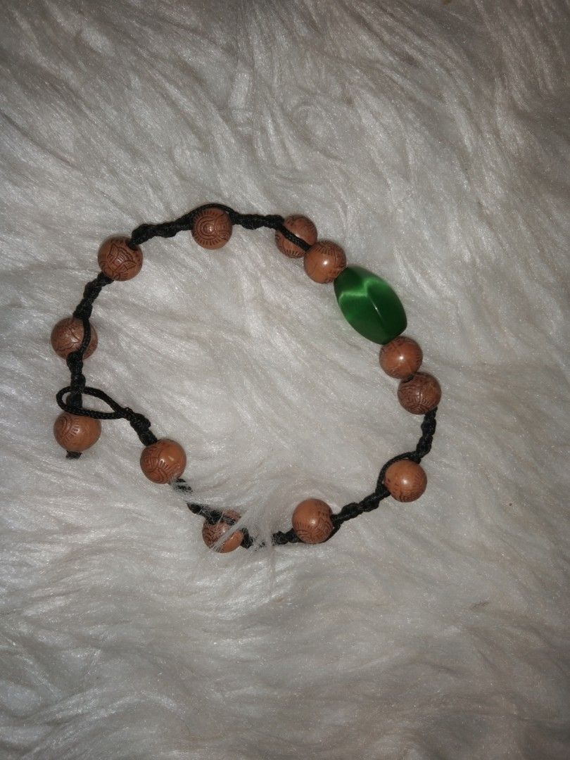 Cat eye bracelet green (Category: Bracelets) located in Quezon City. Submitted by eidorableshop (Listing ID 1461584538, Image 1). Description: .