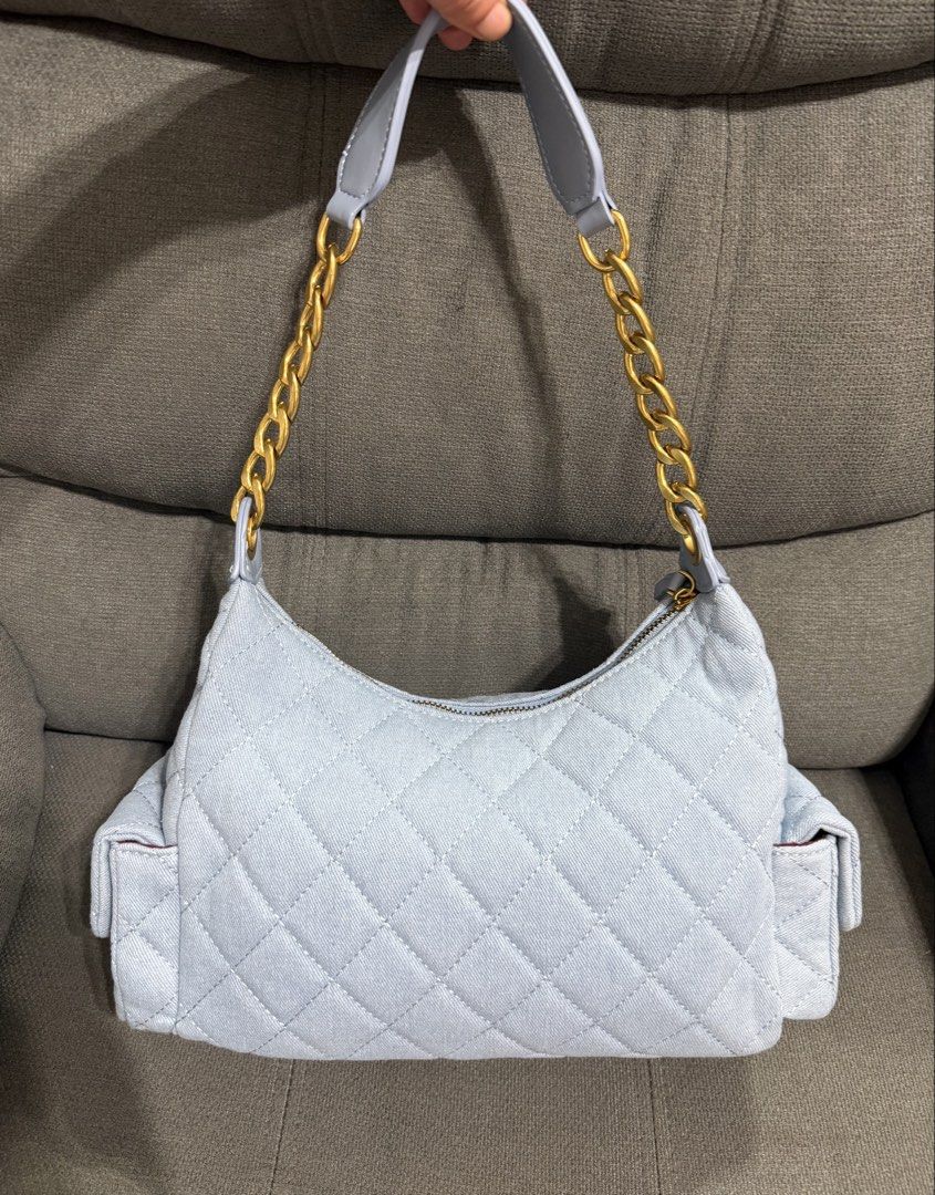CC 25C Denim Cargo Hobo (Category: Shoulder Bags) located in Quezon City. Submitted by chic.bags (Listing ID 1461757838, Image 3). Description: With micro chip Denim material Light blue in color Hood as new No issue Actual photo posted Japan preloved Mop: gcash.
