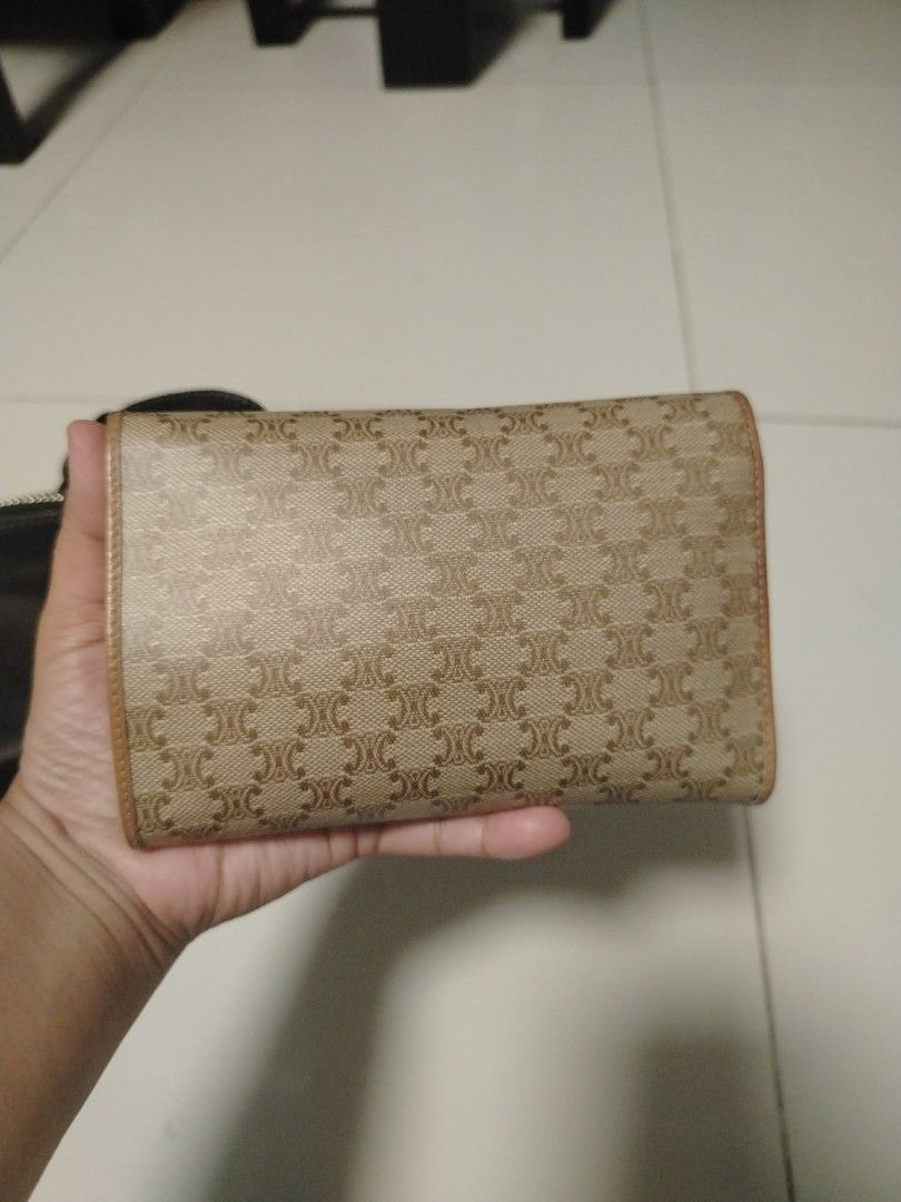 Celine Triomphe Canvas Wallet (Category: Wallets & Card holders) located in Manila. Submitted by wildwind_73f77a (Listing ID 1461644427, Image 2). Description: - Classic Celine wallet with iconic Triomphe canvas pattern. - Elegant brown leather trim. - Small and compact design, ideal for fitting into any bag. - Secure snap closure. - Interior includes convenient card slots and a coin pocket. - Perfect for everyday use..